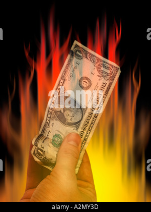 Spreco di denaro sprecando distruggere brutto affare perdita di profitto fiamma di investimento fuoco bruci dollar pound valuta la masterizzazione di flash di calore em Foto Stock