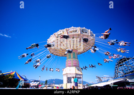 'Wave Swinger' parco dei divertimenti di cavalcare a Playland, Pacific National Exhibition (PNE), Vancouver, BC, British Columbia, Canada Foto Stock