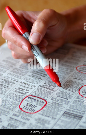 Aiuto voluto sezione del Giornale Foto Stock