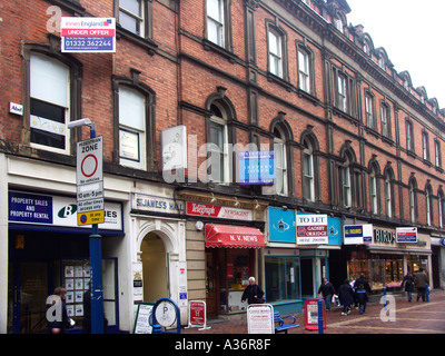 Proprietà commerciali segni di mercato CBD Derby Inghilterra Foto Stock