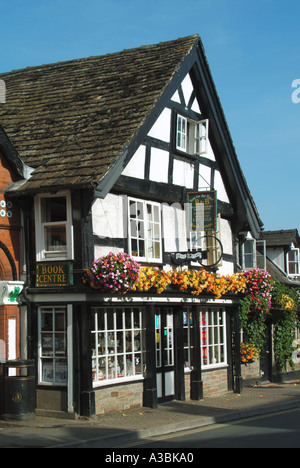 Hay on Wye resto per gli stanchi bed and breakfast istituzione al di sopra di antiquariato e book center locali con segno insolito Foto Stock