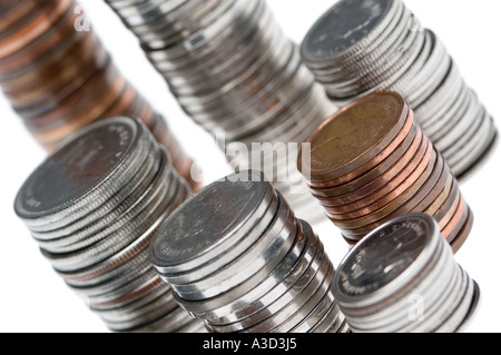 Pile di argento e monete di rame Foto Stock