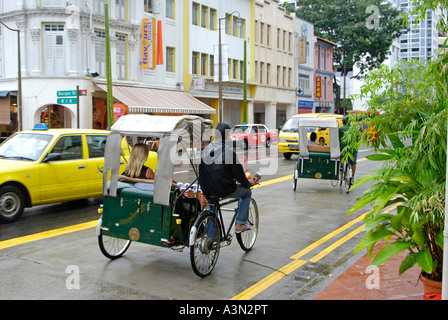 In rickshaw su South Bridge Road, Singapore Foto Stock