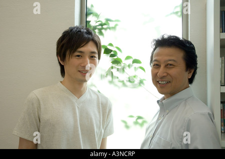 Ritratto di padre e figlio adulto Foto Stock