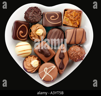 Cioccolatini belgi nel cuore piatto sagomato Foto Stock