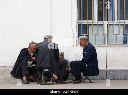 Uighur uomini carte da gioco Foto Stock