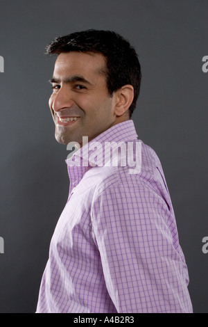 Sorridente Uomo asiatico Foto Stock