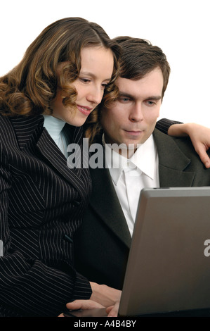 Di fronte a un computer portatile Foto Stock