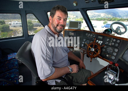 John Bennett che skipper il peschereccio San aspiranti che ha catturato il più grande mai colossale di calamari Foto Stock