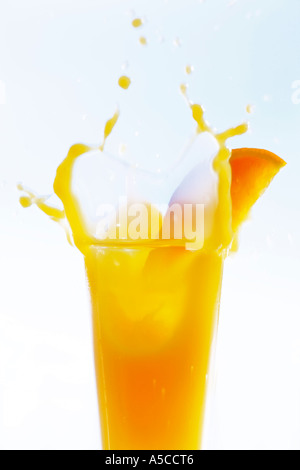 Succo di arancia schizzi, close-up Foto Stock