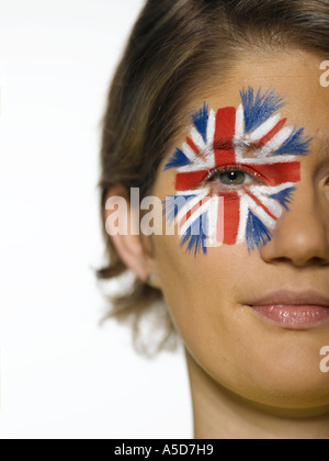 Donna con Union Jack dipinto sul volto, ritratto Foto Stock