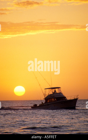 Una barca da pesca e al tramonto a Key West Florida Foto Stock