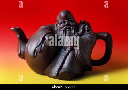 Buddha antichi tè pentola Foto Stock