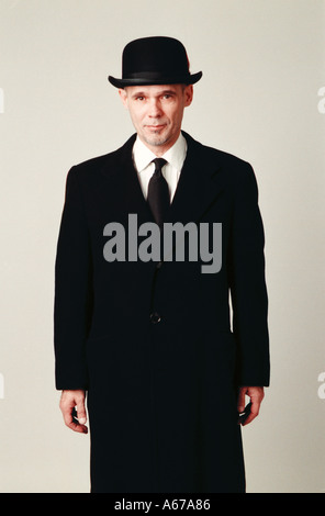 Uomo con cappello bowler Foto Stock
