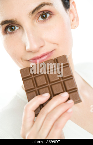 Donna con il cioccolato Foto Stock