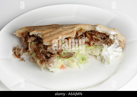 Döner kebap sulla piastra, bite rimosso, fast food, da asporto, kebab Foto Stock