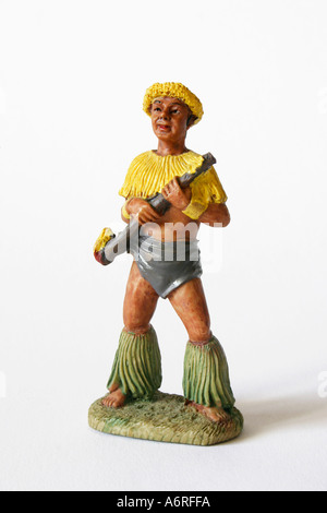 Maschio hawaiano ceramica statuetta statua o bambola nel tradizionale abbigliamento nativo Foto Stock