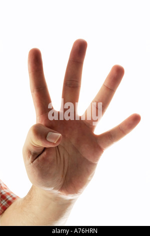 La mano che mostra quattro dita, close-up Foto Stock