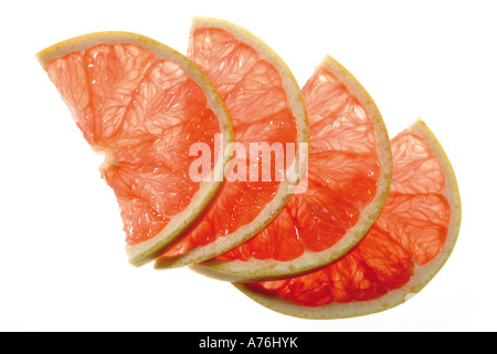 Diversifyed fette di ugli graipfruit rosso rubino, vista in elevazione, close-up Foto Stock