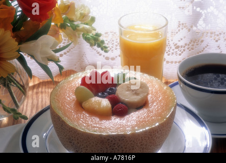 Sana Colazione Melone con frutta e caffè Foto Stock