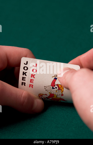 Mani coppia di jokers Foto Stock