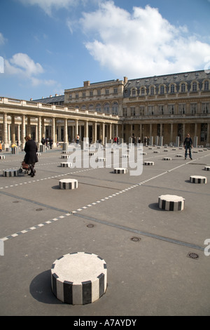 Jardin du Palais Royal including the black and white columns by Daniel Buren and the Orleans Gallery Paris France Foto Stock