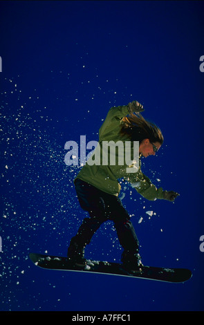 Snowboarder in aria Foto Stock