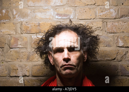 Ritratto di un uomo di mezza età con un depresso e nevrotica look, keith richard doppio Foto Stock