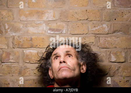 Ritratto di un uomo di mezza età con un depresso e nevrotica look, keith richard doppio Foto Stock