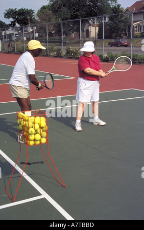 Tennis di apprendimento Foto Stock
