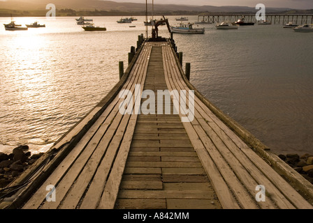 Tramonto sul molo al villaggio Moeraki Harbour North Otago Nuova Zelanda Foto Stock