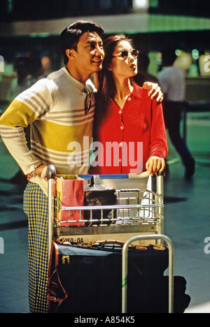 Giovani asiatici giovane all'aeroporto. Foto Stock