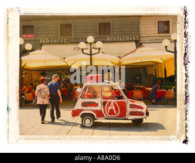 Dipinto di tre ruote auto in Firenze Italia Foto Stock