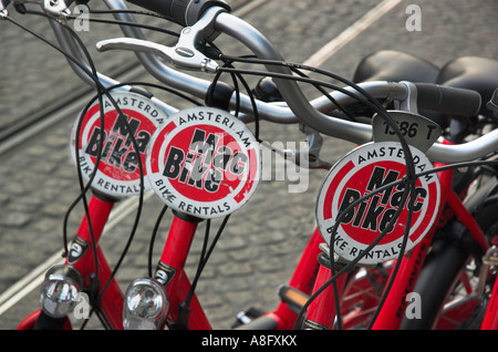 Tre noleggiato biciclette in Amsterdam Foto Stock