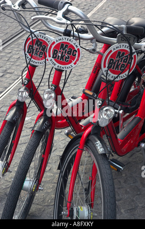 Tre noleggiato biciclette in Amsterdam Foto Stock