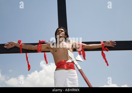 La Crocifissione di flagellants, Venerdì Santo riti quaresimali, San Pedro Cutud, San Fernando, Filippine Foto Stock