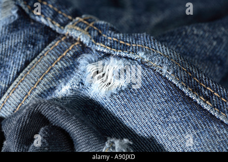 Jeans strappati blu Foto Stock