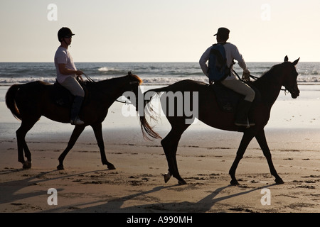 Equitazione turistica sulla spiaggia di Legian, Bali, Indonesia Foto Stock