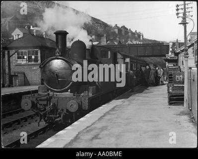 Salire a bordo di un treno a vapore Foto Stock