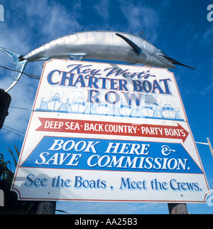 Segno per imbarcazioni charter in barca a Noleggio fila, Key West, Florida, Stati Uniti d'America Foto Stock