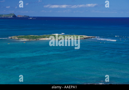 Surfers off piatta isola la Baia di Kailua Oahu Hawaii Foto Stock