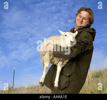 Pastore con pecora Foto Stock