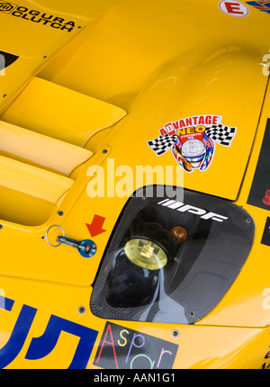 Il faro e la sezione del cofano di un giallo Giappone GT racing car, Sepang International Circuit, Malaysia Foto Stock