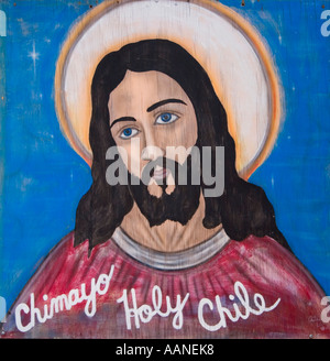 La pittura di Gesù Cristo pubblicità peperoncini santo in un bar vicino la Lourds d'America in Chimayo New Mexico Foto Stock