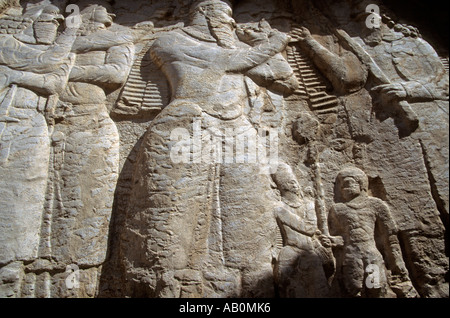 Il bassorilievo carving dettaglio in rovina e antica città di Persepolis, Iran, Medio Oriente Foto Stock