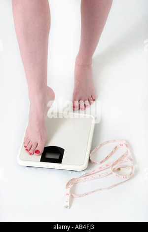 Stepping sulla scala Foto Stock