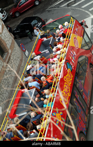 Open top tourbus per la visita della città. Malaga Spagna del sud Europa. Foto Stock