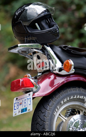 Casco su una moto Foto Stock