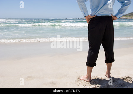 Imprenditore in spiaggia Foto Stock