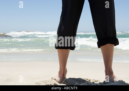 Imprenditore in spiaggia Foto Stock